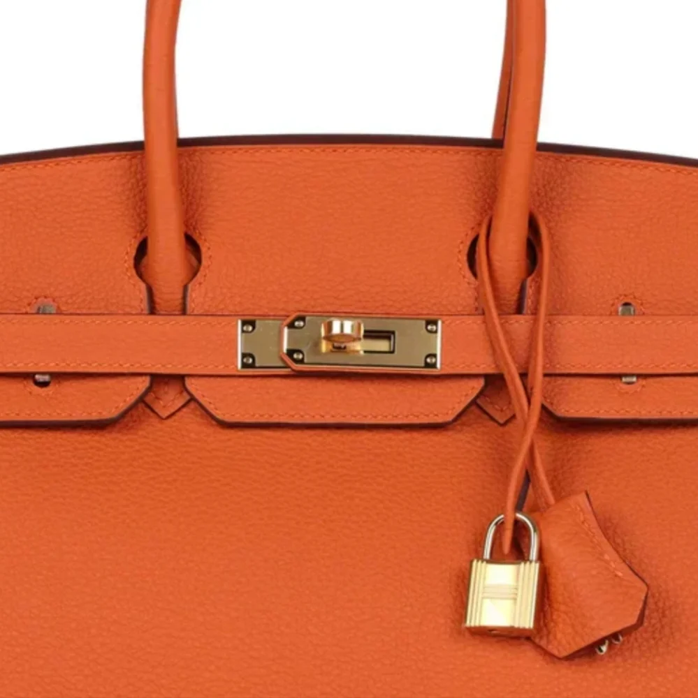 Structured Orange Leather Top-Handle Satchel with Gold-Tone Hardware